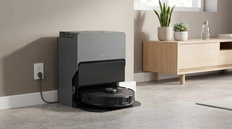 Roborock S8 Max Ultra robot vacuum in its dark gray RockDock Ultra in a living room